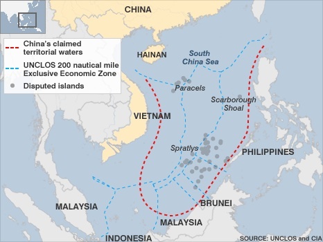 A red line showing Chinas claimed territorial but disputed territorial waters that stretches from Vietnam to the Philippines. A blue line showing UNCLOS 200 nautical mile exclusive economic zone.
Contested islands in the area shown in grey around the south China sea.