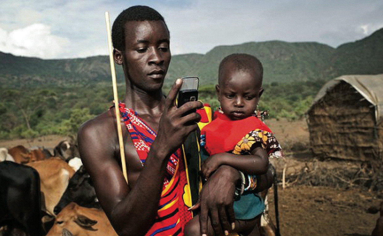 Masai using mobile phone 